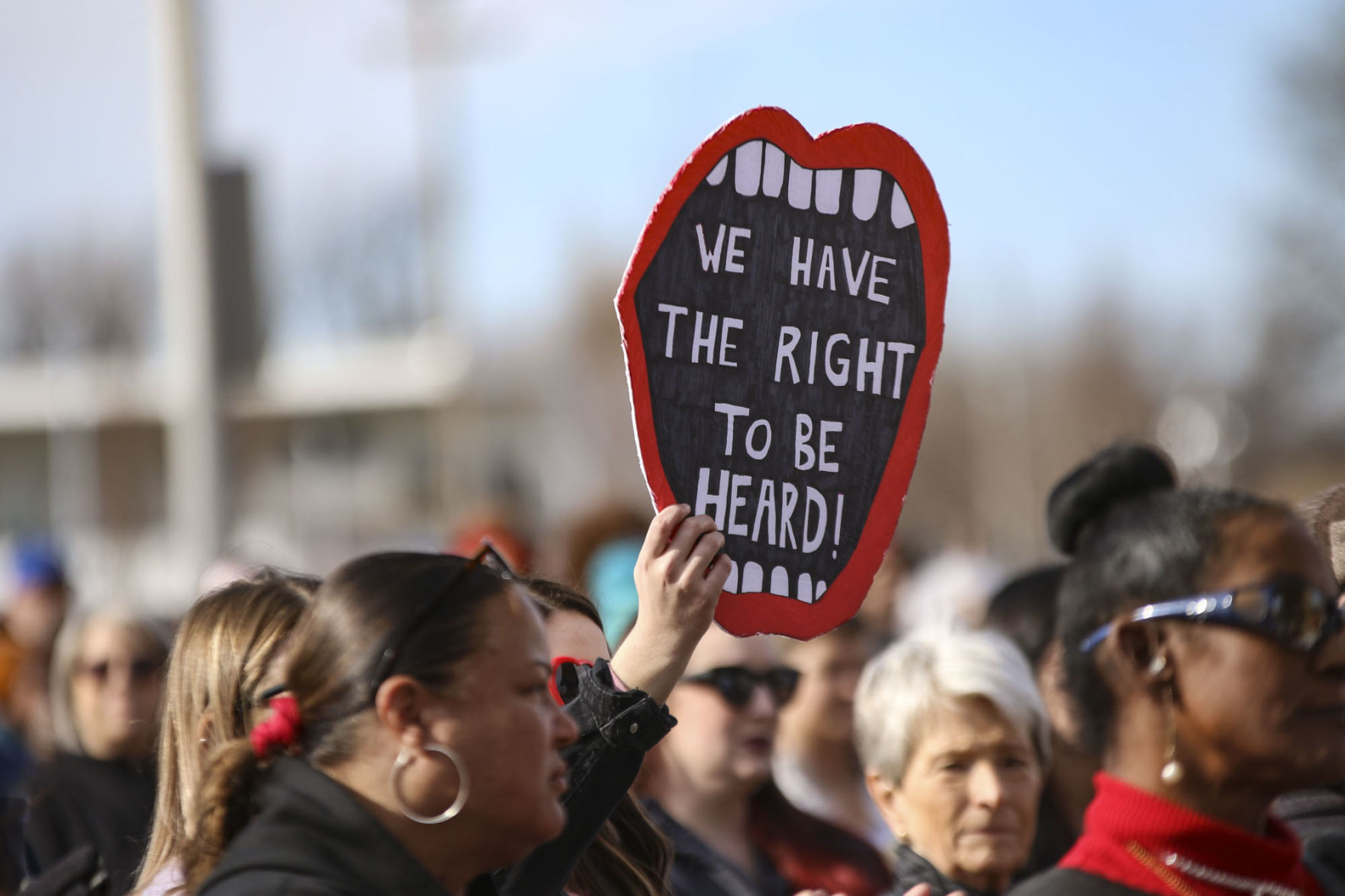 “We have the right to be heard!” sign